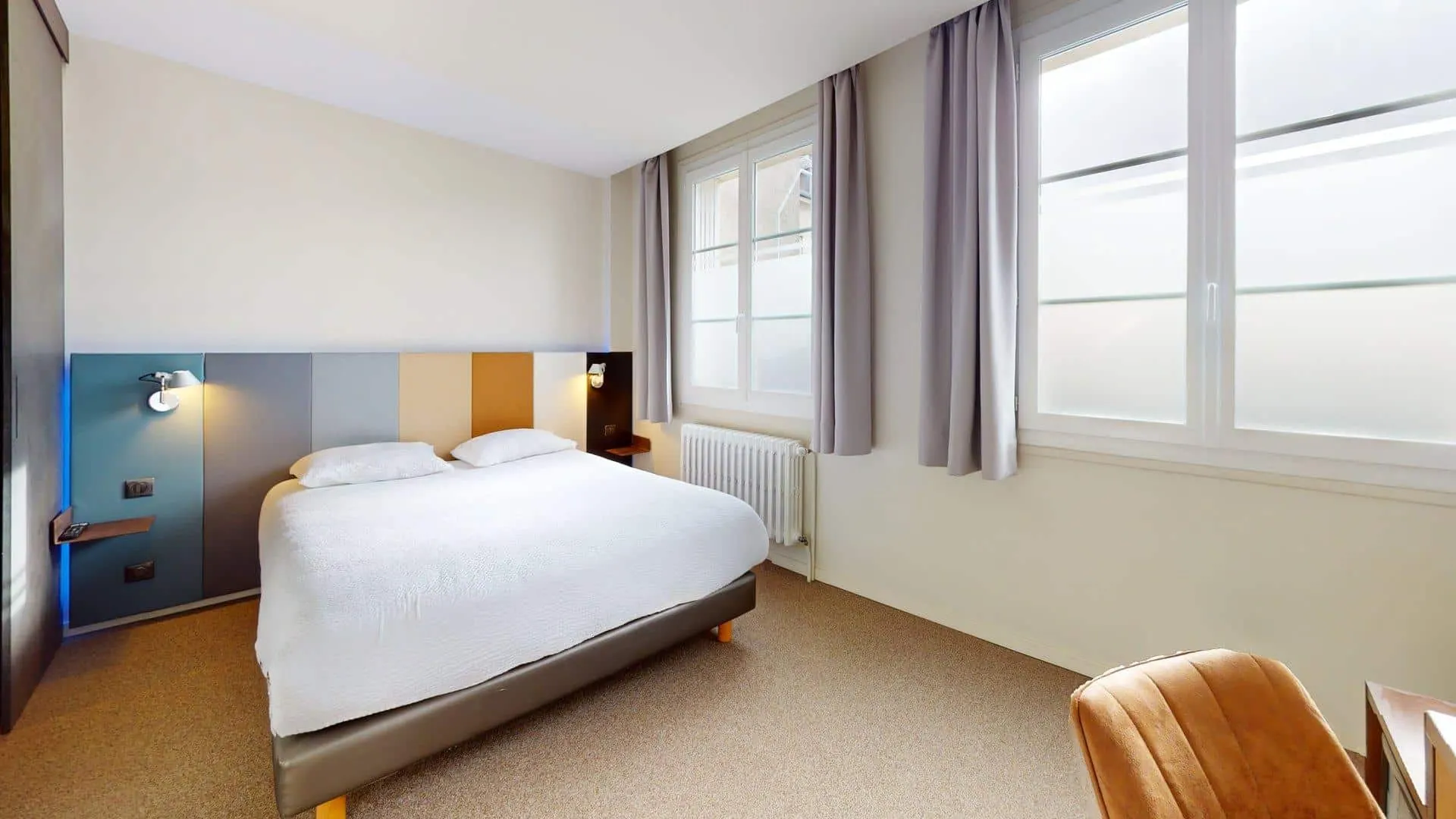Chambre avec lits jumeaux de l'Hôtel de Harlay